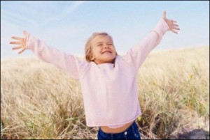 Happy kid in field