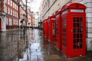 Red phone booths rainy